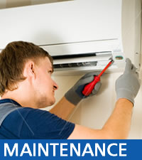 Engineer maintaining A/C unit